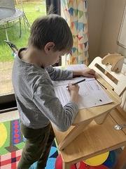 Joseph at his EIGER Student classroom standing desk